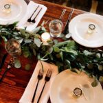 greenery and plating on farm table